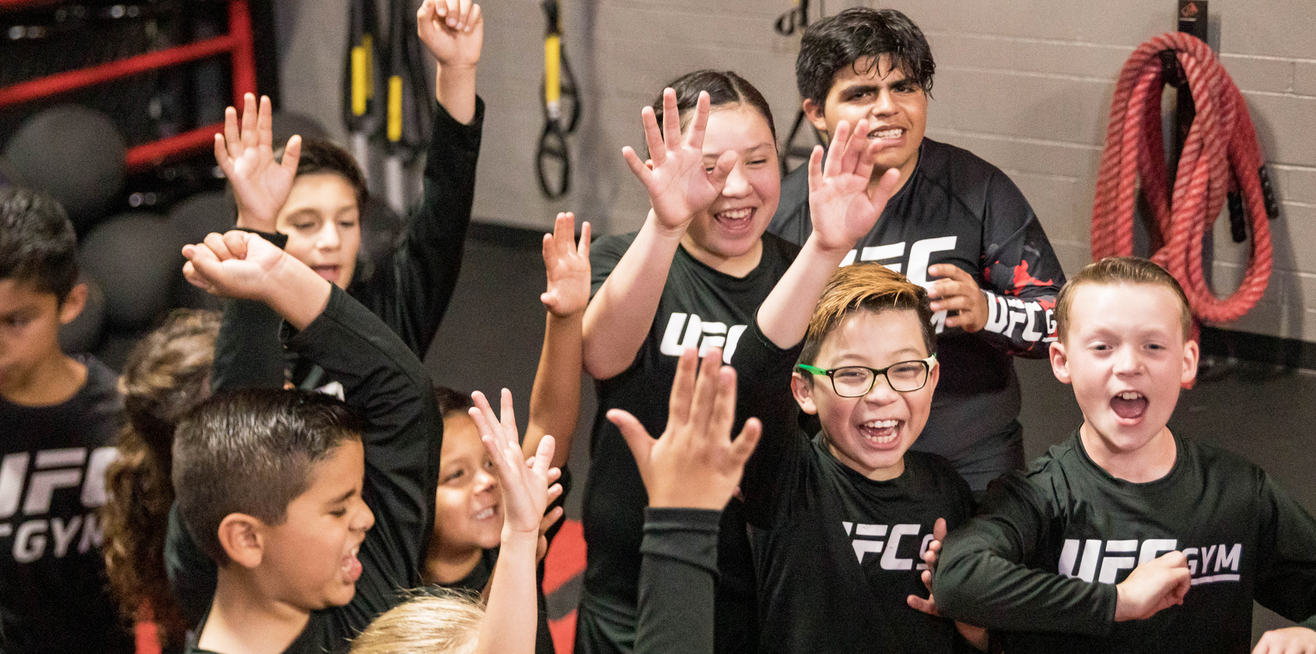 A group of young members cheering