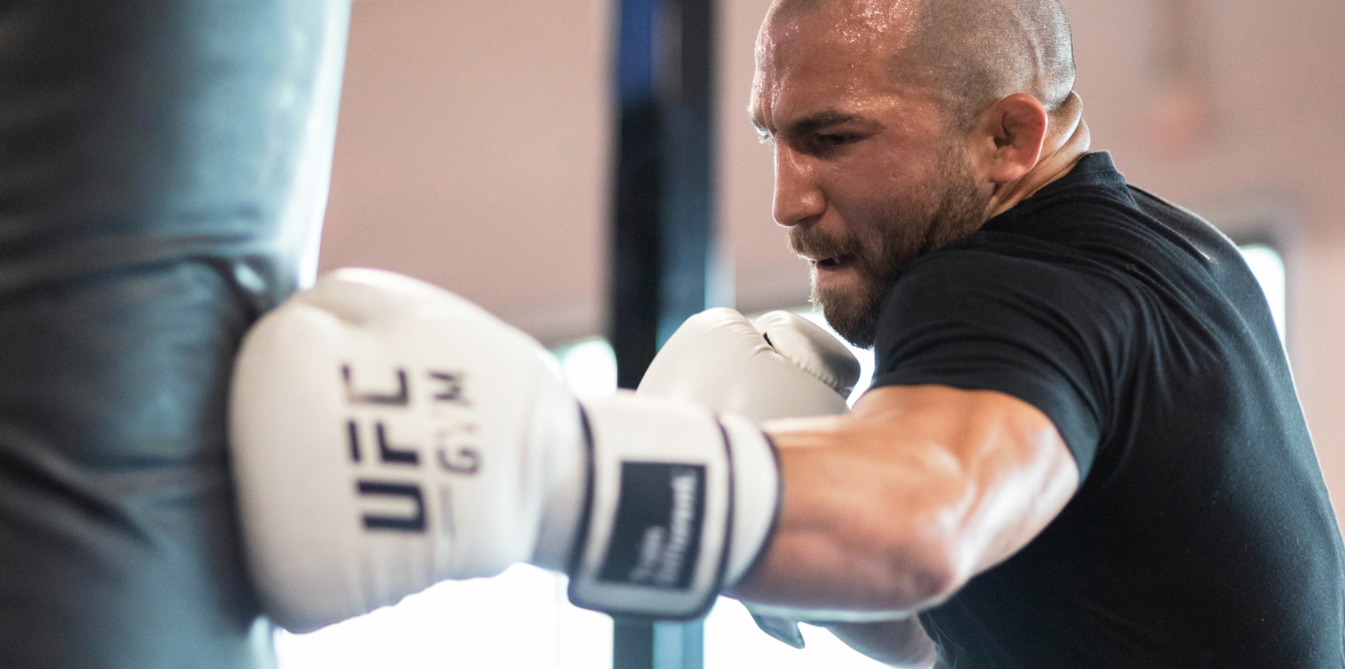 A member punching a bag