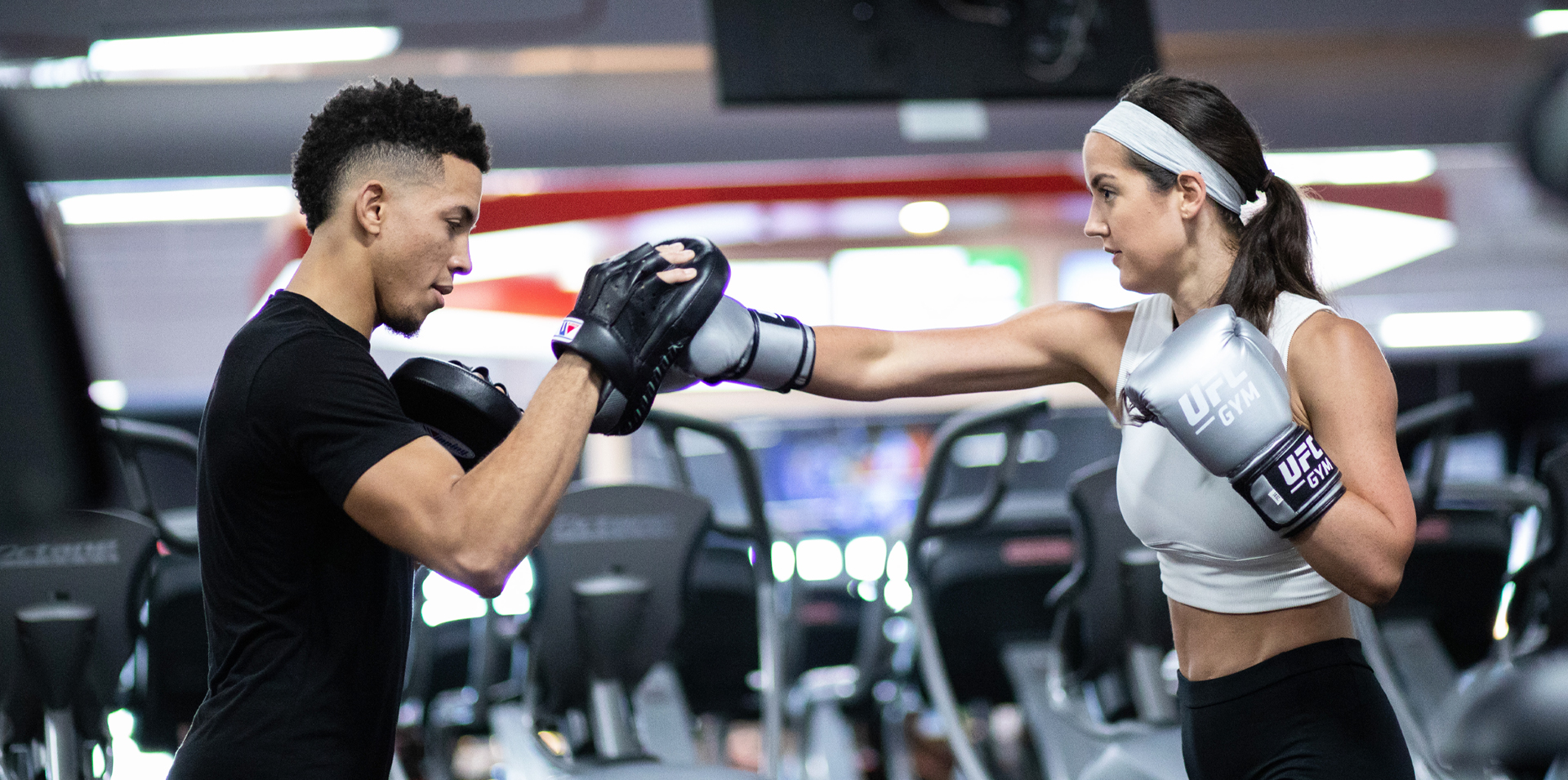 Member and coach punching together